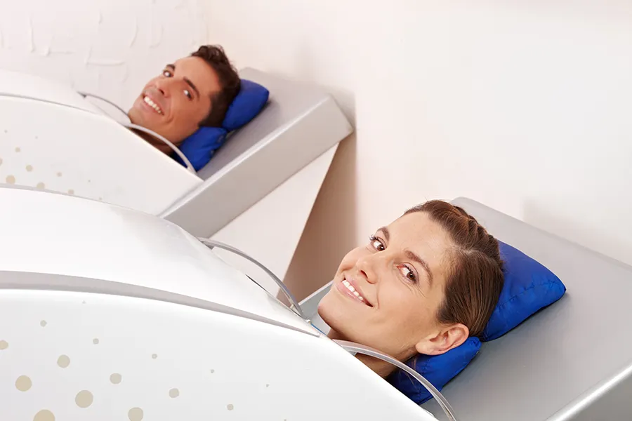 HOCATT-Ozone-Sauna-Clinic A couple in HOCATT ozone sauna beds. Get HOCATT Ozone Sauna treatment from Delara Tavakoli, M.D. of Tavicare in Chevy Chase.
