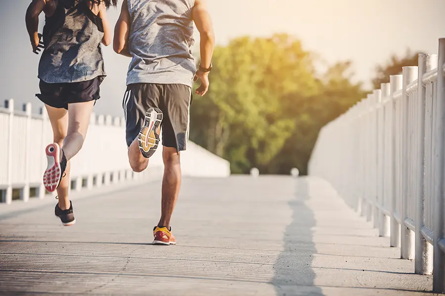 Thymosin-Beta-4-Peptide-Clinicwebp A couple runs across a bridge on a nice afternoon. Schedule Thymosin Beta 4 peptide therapy for immune function and weight loss from Delara Tavakoli, M.D. of Tavicare in Chevy Chase.
