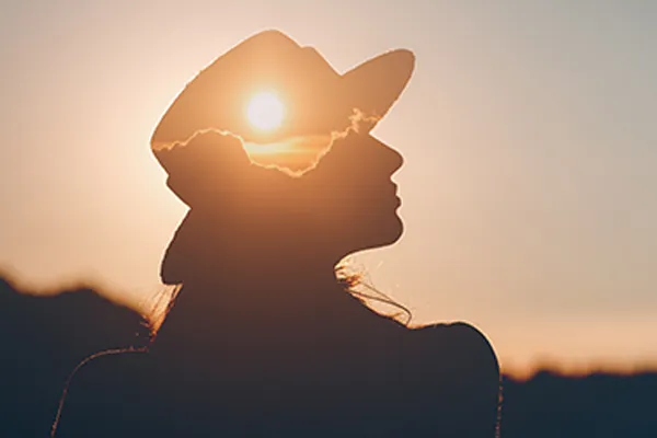 selank-peptides A woman silhouetted by the sunset. Schedule Selank peptide therapy from Delara Tavakoli, M.D. of Tavicare in Chevy Chase.
